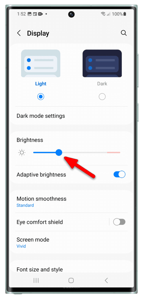 Drag the Brightness slider to the left.