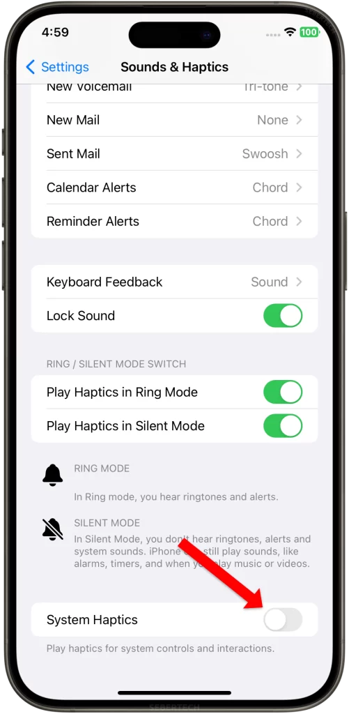 Disable the switch next to System Haptics on iPhone 15.